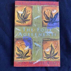 The Four Agreements : A Practical Guide to Personal Freedom by Don Miguel Ruiz.